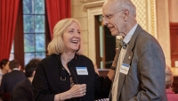 CPTR faculty members in casual conversation at an event